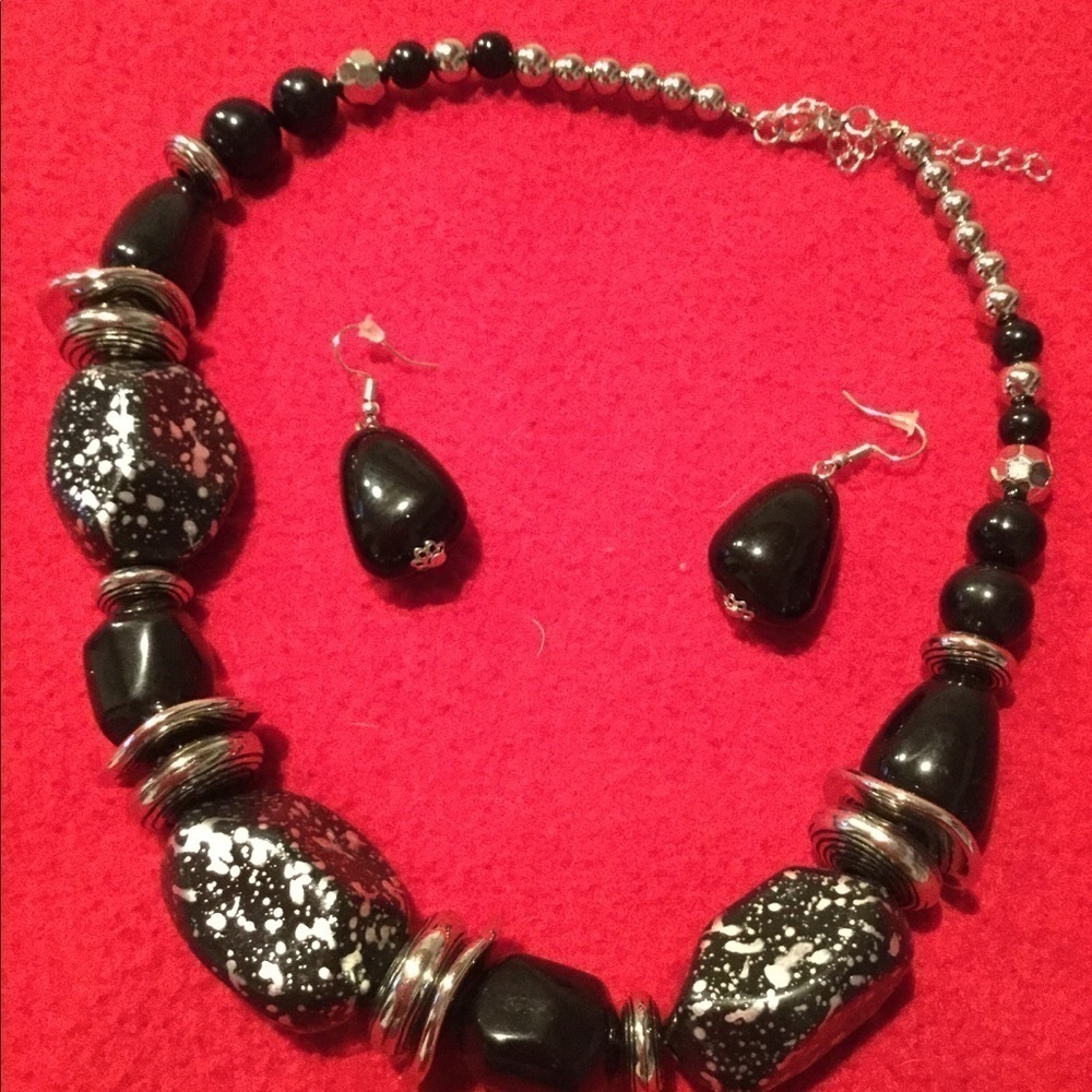 BLACK and silver necklace and earrings set.